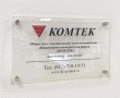 Табличка из закаленного стекла 5 мм, логотип и текст – плоттерная резка, 4 дистанционных держателя, 410 х 250 мм. Стоимость 3340 рублей.